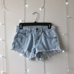 Light wash “the frayed mid rise” jean shorts